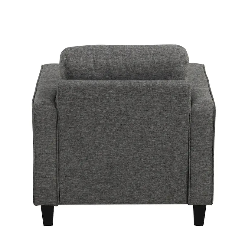 Un fauteuil de style moderne avec des pieds coniques en bois massif et des coussins en tissu ; un canapé individuel.