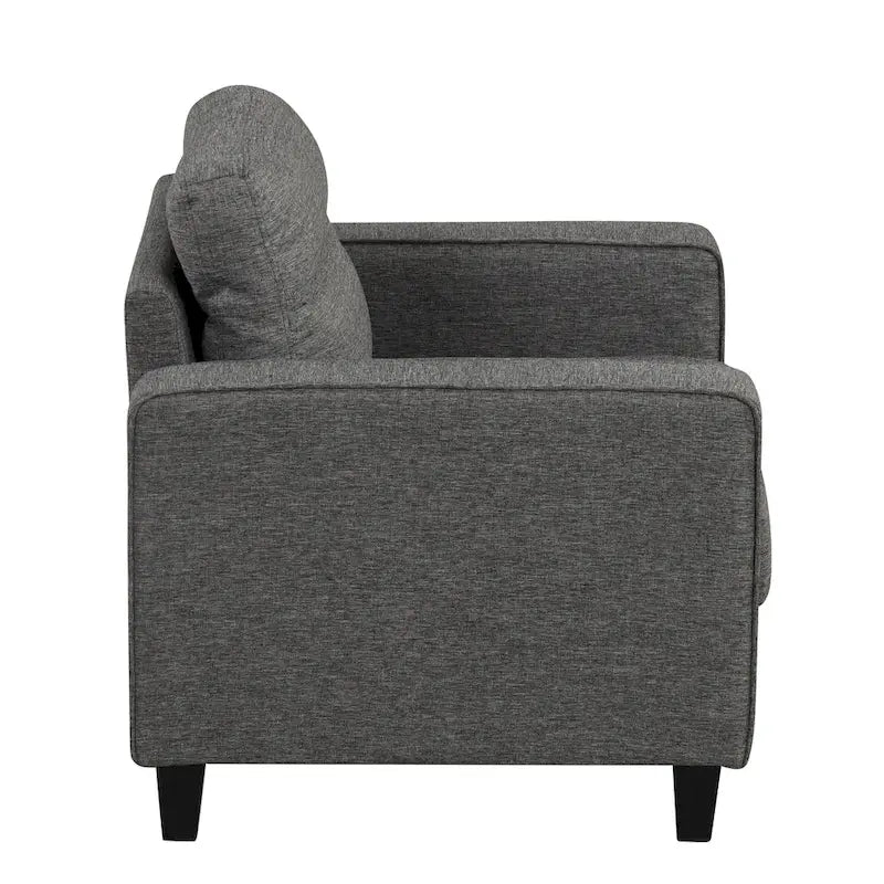 Un fauteuil de style moderne avec des pieds coniques en bois massif et des coussins en tissu ; un canapé individuel.