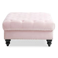 Grand pouf capitonné en velours