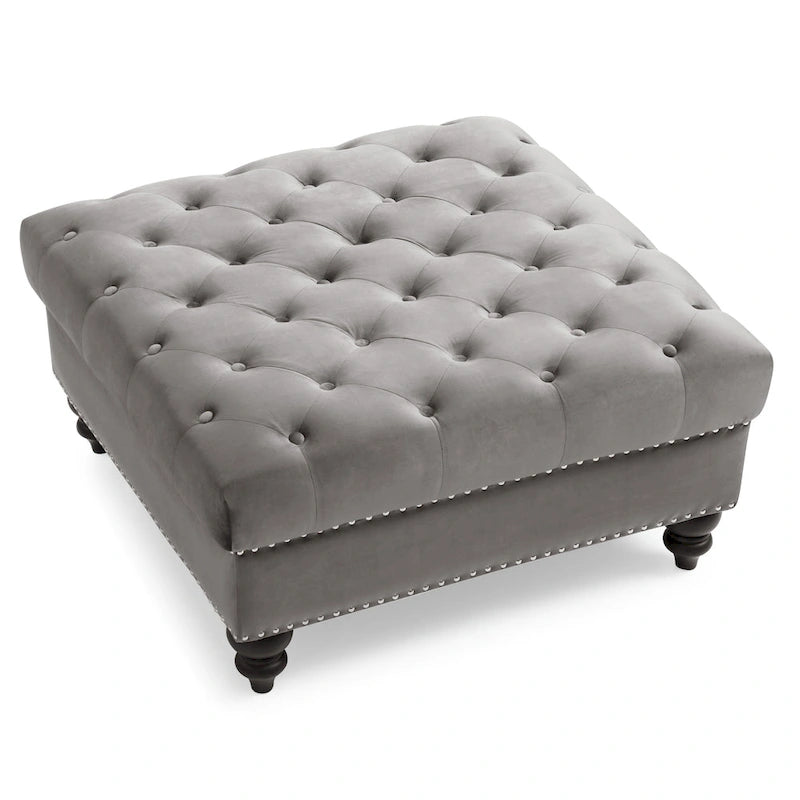 Grand pouf capitonné en velours