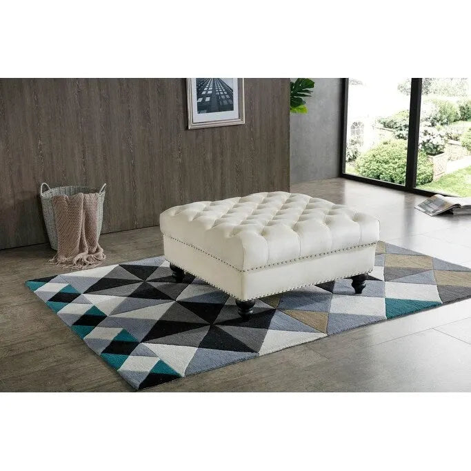 Grand pouf capitonné en velours