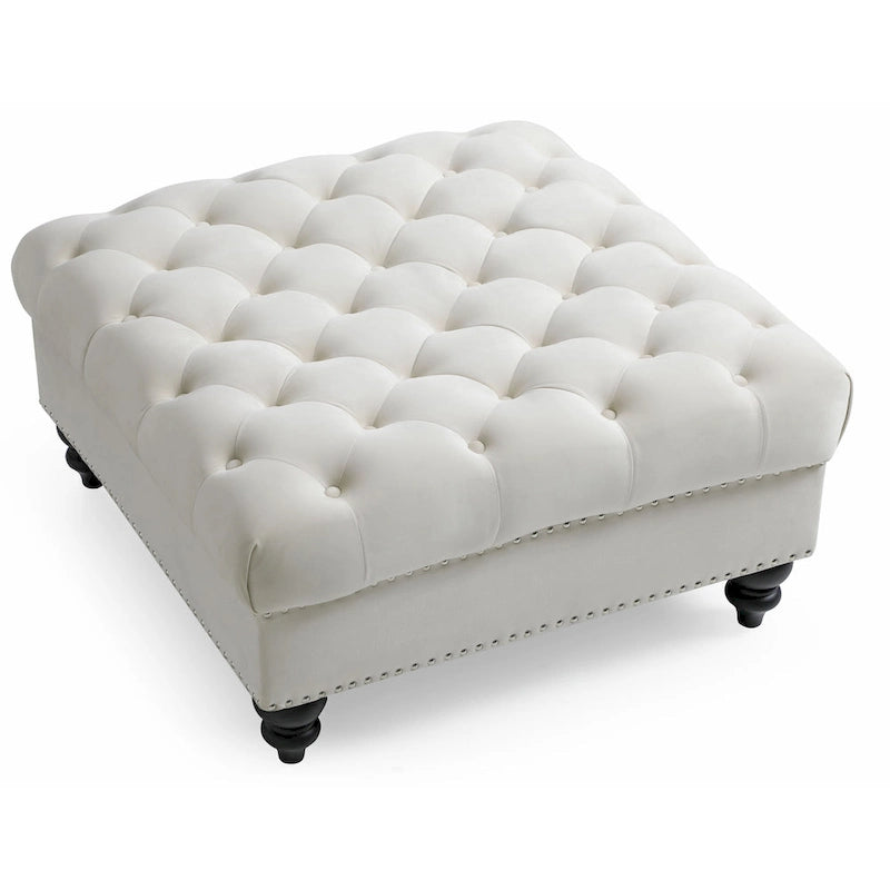 Grand pouf capitonné en velours