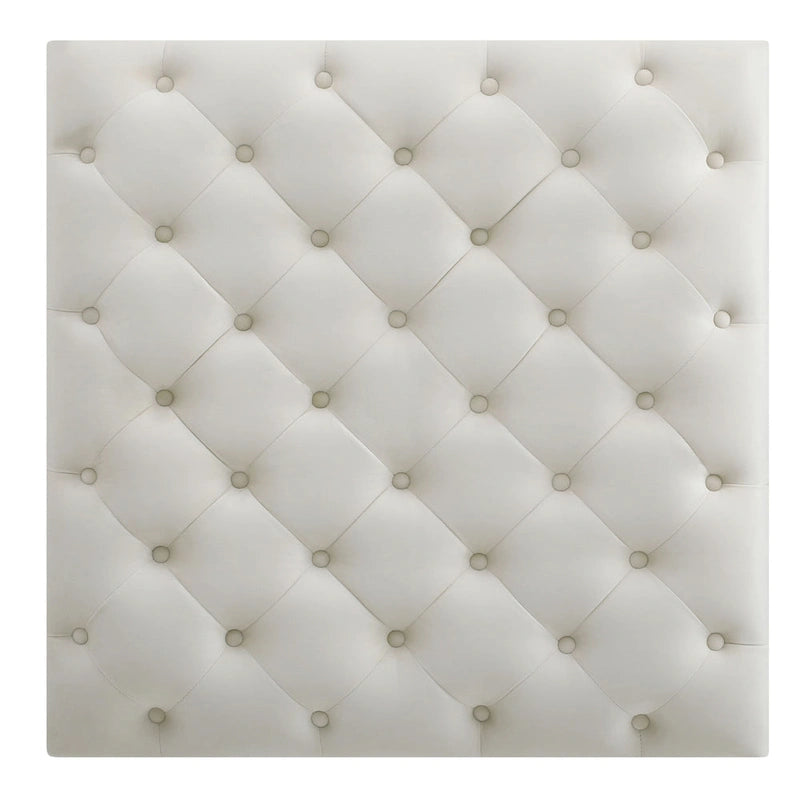 Grand pouf capitonné en velours