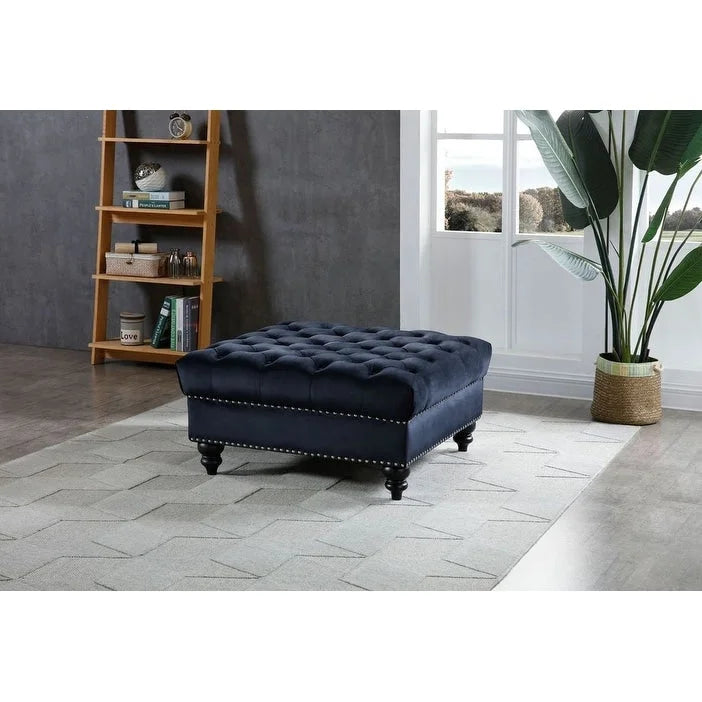 Grand pouf capitonné en velours